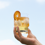 Bottle of Polka De-Alc Yuzu & Mandarin Spritz, citrus-forward non-alcoholic aperitivo
